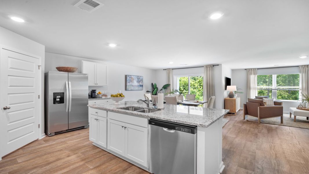 Representative furnished interior of a home built from the Cali by D.R. Horton in Palm Ridge, Guyton (Image 5).