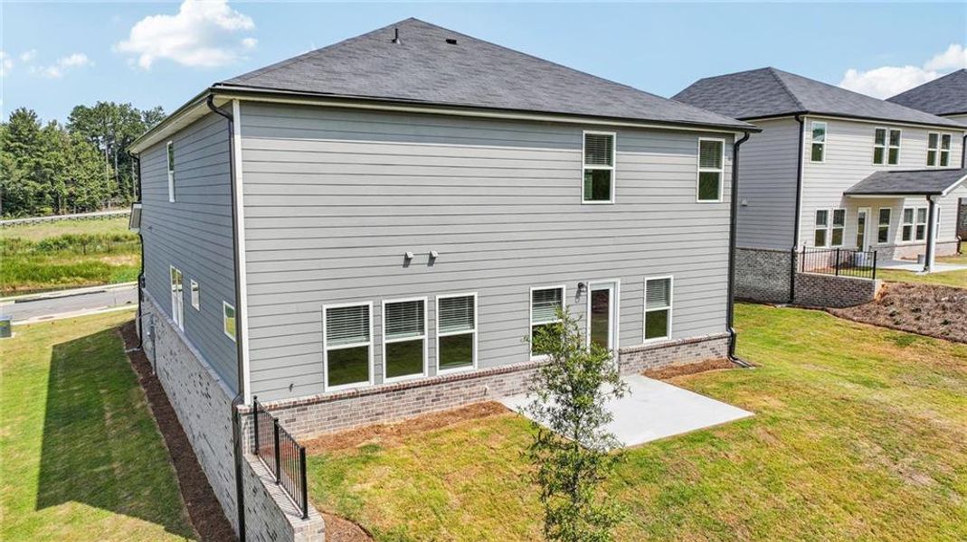 Exterior details and patio area of a home in Preserve at Mountain Creek, Pendergrass (Image 18).