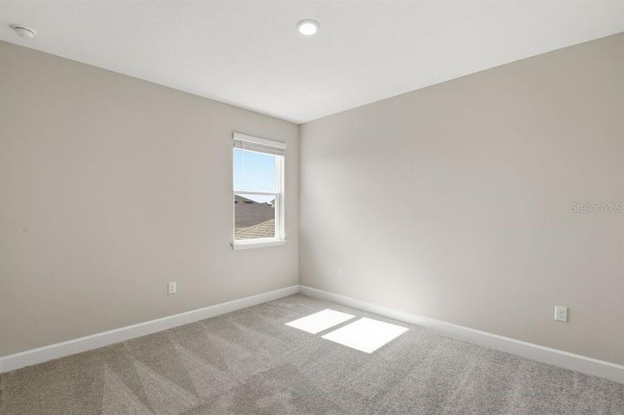 Spacious, unfurnished interior of a new home in Harvest at Ovation, Winter Garden (Image 20).