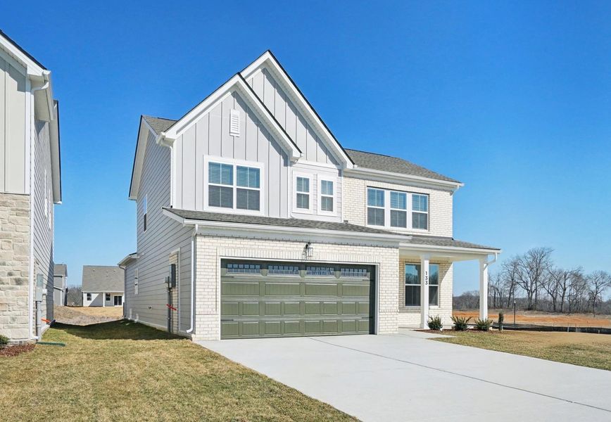 Front exterior of a new home in Ascent at Arbor Ridge, La Vergne, TN, highlighting curb appeal (Image 23).