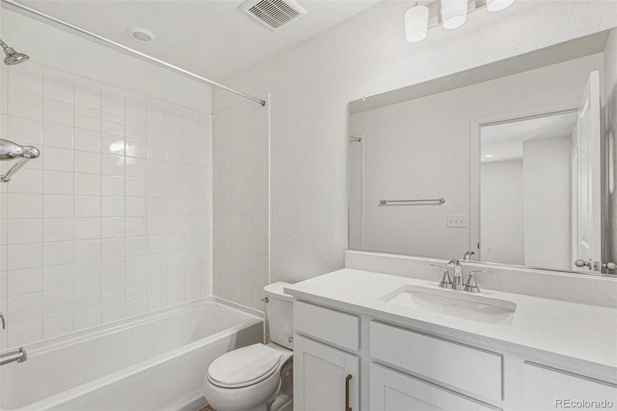 Furnished interior view inside a new home in Turnberry Villas, Commerce City (Image 11).