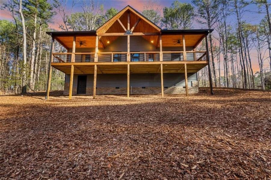 Exterior details and patio area of a home in , Ellijay (Image 25).