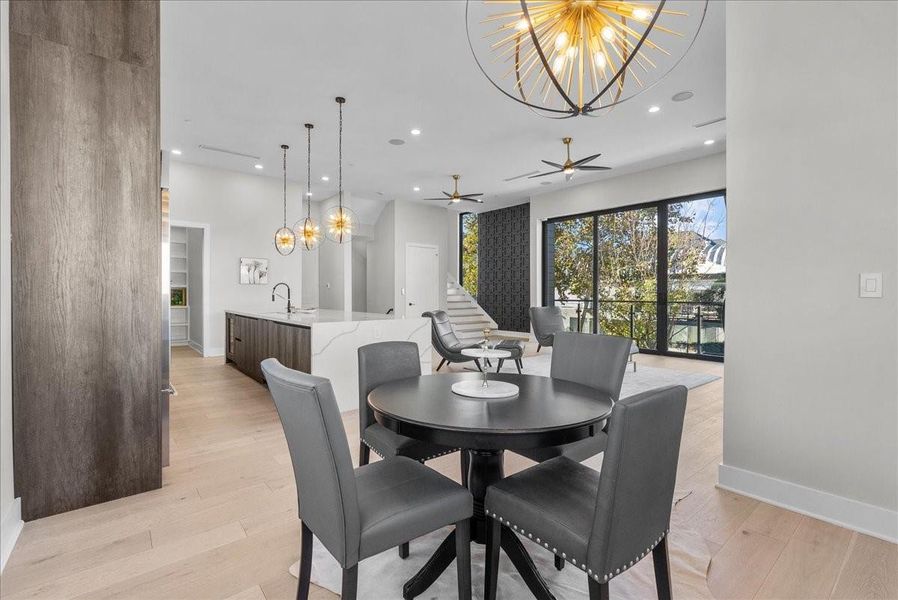 Talk about an open concept — the living, kitchen, and dining areas flow together seamlessly, creating a bright and inviting space perfect for everyday living and entertaining.