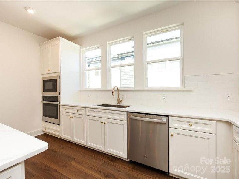 Large Bright Window Above Modern Single Basin Sink