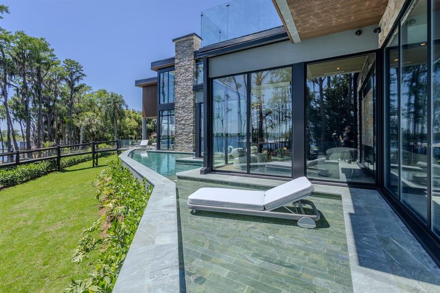 Exterior details and patio area of a home in , Windermere (Image 24).