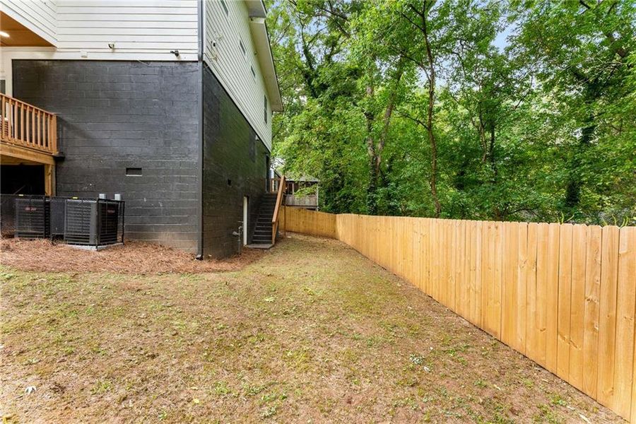 Front exterior of a new home in , Atlanta, GA, highlighting curb appeal (Image 23).