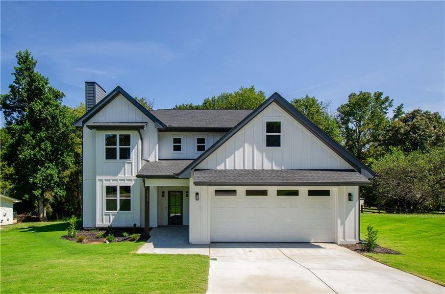 Front exterior of a new home in , Gainesville, GA, highlighting curb appeal (Image 21).