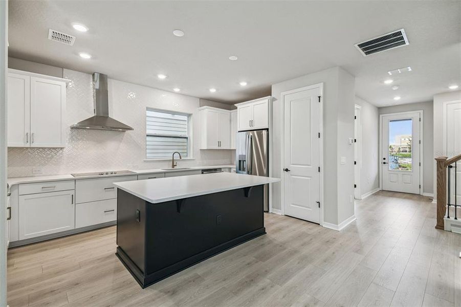 Furnished interior view inside a new home in Weslyn Park in Sunbridge 34', St. Cloud (Image 9).
