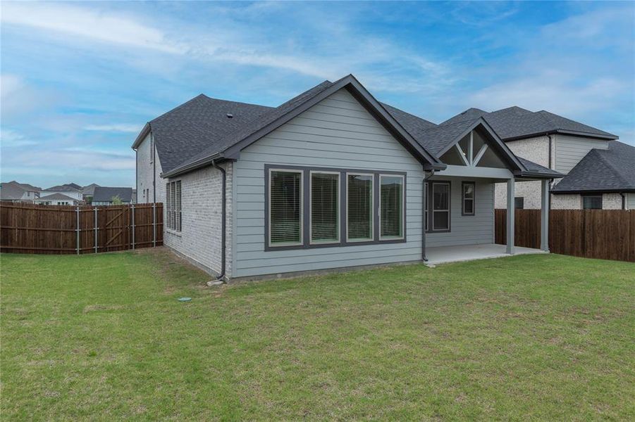 Spare room with light wood-style flooring and baseboards