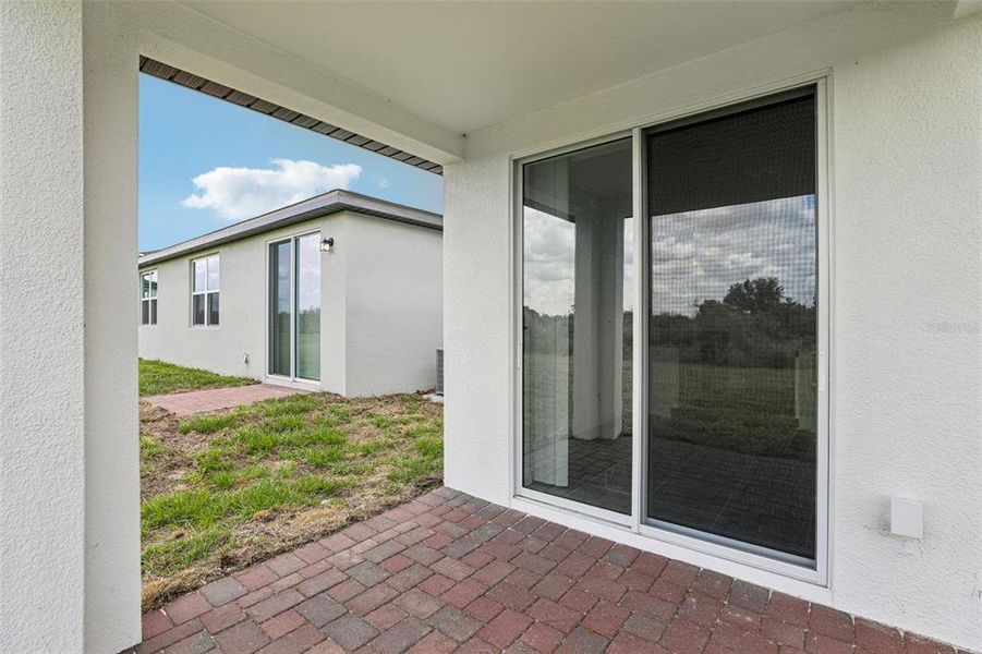 Exterior details and patio area of a home in Hamilton Bluff - Signature Series, Lake Hamilton (Image 28).