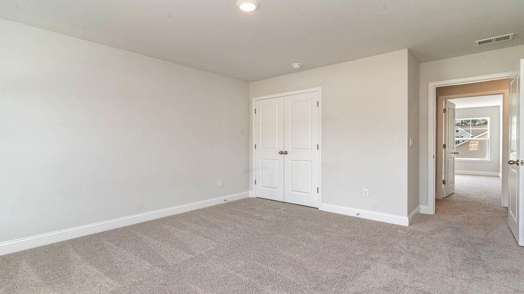 Representative unfurnished interior of a home built from the FORRESTER by D.R. Horton in Haven View, Murrells Inlet (Image 30).