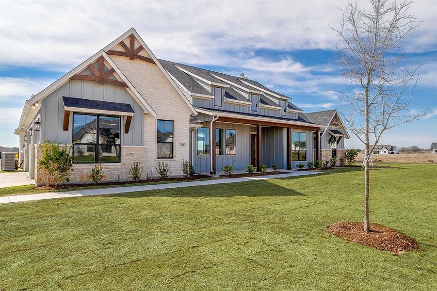 Front exterior of a new home in , Waxahachie, TX, highlighting curb appeal (Image 23). Front exterior of a new home in , Waxahachie, TX, highlighting curb appeal (Image 23).