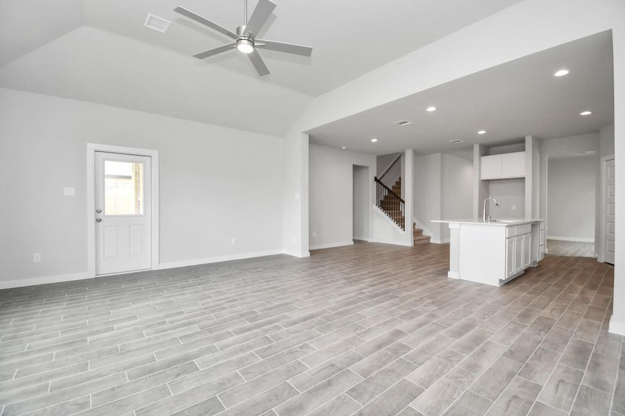 Take another glimpse into the heart of the home with this additional view of the family room—a sprawling space ready to accommodate all your gatherings. Sample photo, actual color and selections can vary. Take another glimpse into the heart of the home with this additional view of the family room—a sprawling space ready to accommodate all your gatherings. Sample photo, actual color and selections can vary.