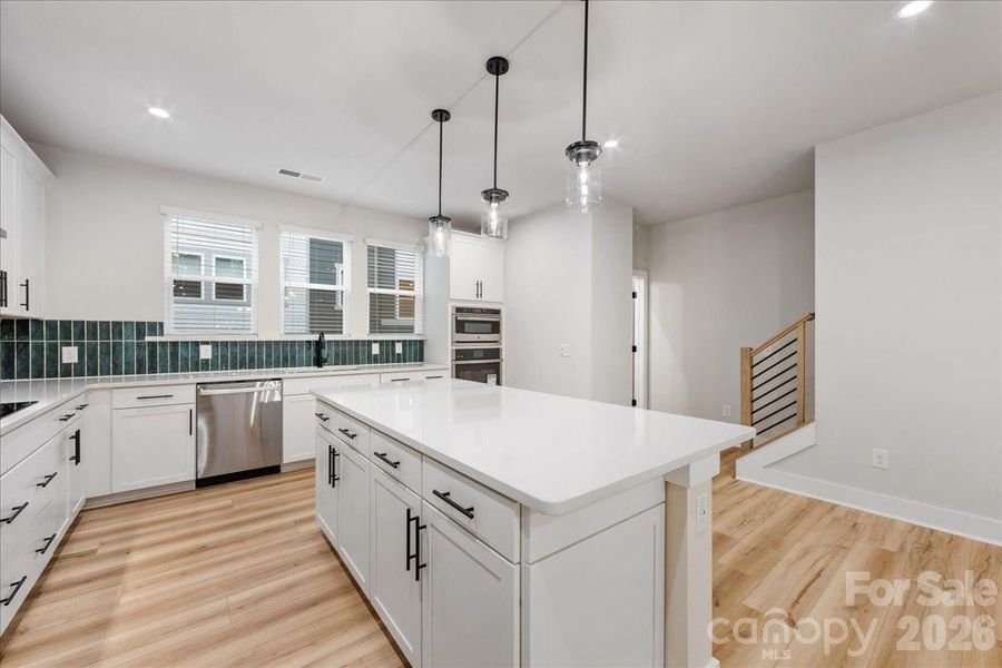 Included GE Stainless Appliances.