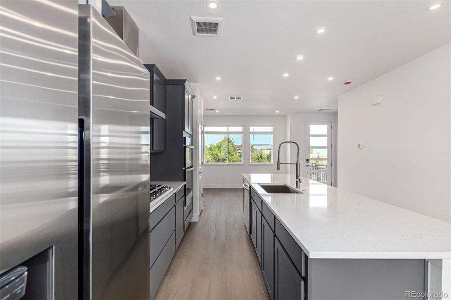 Furnished interior view inside a new home in Ascent at Inverness, Englewood (Image 6).