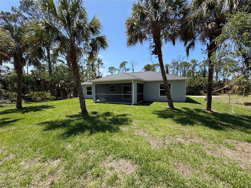 Exterior details and patio area of a home in , North Port (Image 22).