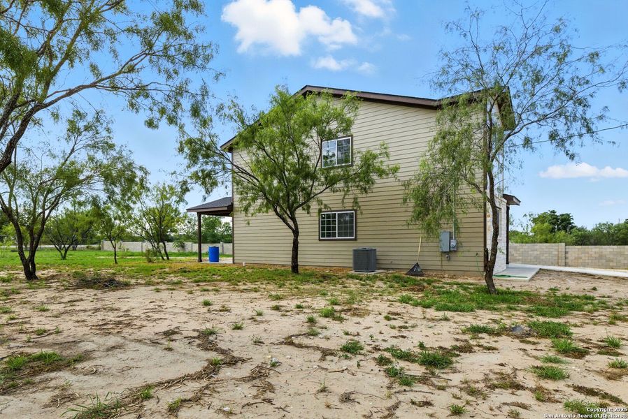 Front exterior of a new home in , Lytle, TX, highlighting curb appeal (Image 19). Front exterior of a new home in , Lytle, TX, highlighting curb appeal (Image 19).