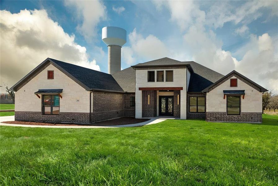 Front exterior of a new home in , Granbury, TX, highlighting curb appeal (Image 25).