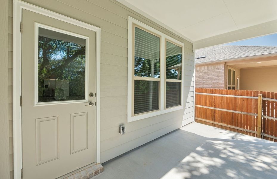 Exterior details and patio area of a home in Saddleback at Santa Rita Ranch, Liberty Hill (Image 28).