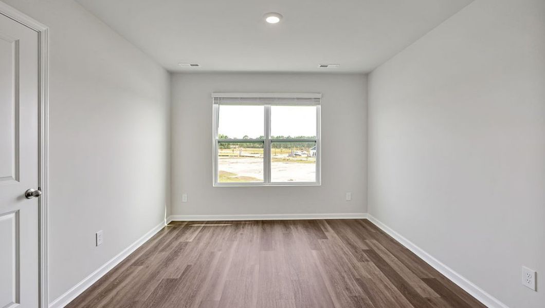 Representative unfurnished interior of a home built from the Hayden by D.R. Horton in Cedar Hill Landing, Navassa (Image 31).