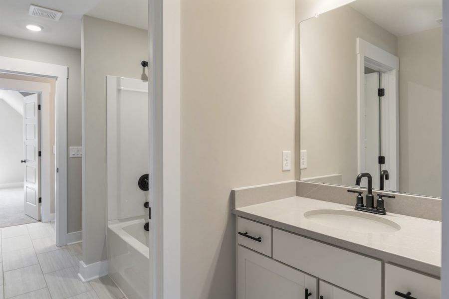Representative furnished interior of a home built from the Bowman by Hunter Quinn Homes in Landing at Clemson Marina, Seneca (Image 7).