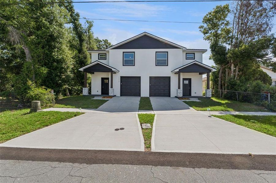 Front exterior of a new home in , Lakeland, FL, highlighting curb appeal (Image 24).
