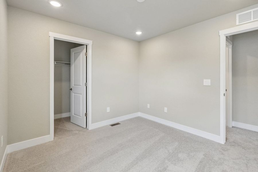 Spacious, unfurnished interior of a new home in The Trails at Aspen Ridge, Colorado Springs (Image 46).