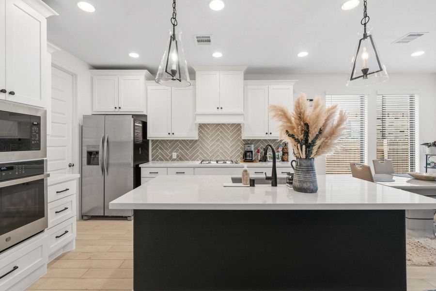 Chef-inspired kitchen offering ample counter space and a functional layout