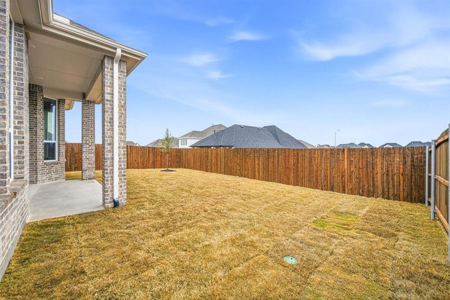 Exterior details and patio area of a home in Wildflower Ranch, Fort Worth (Image 3).