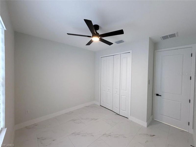 Spacious, unfurnished interior of a new home in , Lehigh Acres (Image 29).