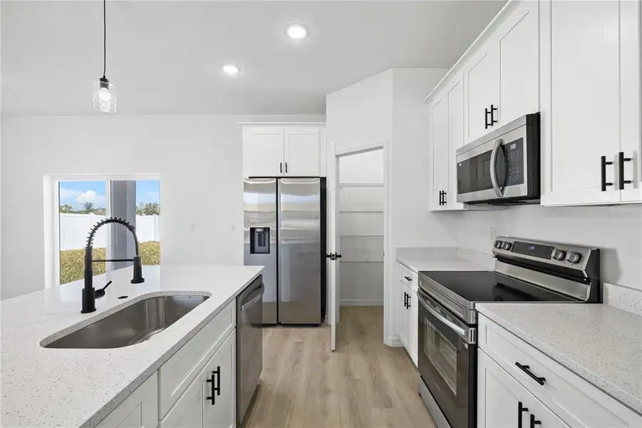 Furnished interior view inside a new home in , Poinciana (Image 5).
