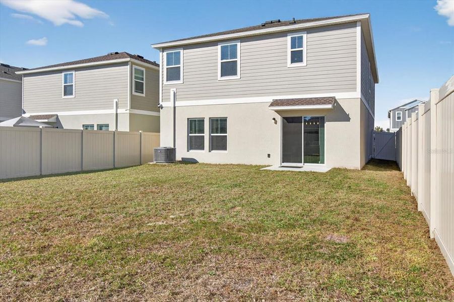 Exterior details and patio area of a home in Pasadena Point, Wesley Chapel (Image 31). Exterior details and patio area of a home in Pasadena Point, Wesley Chapel (Image 31).