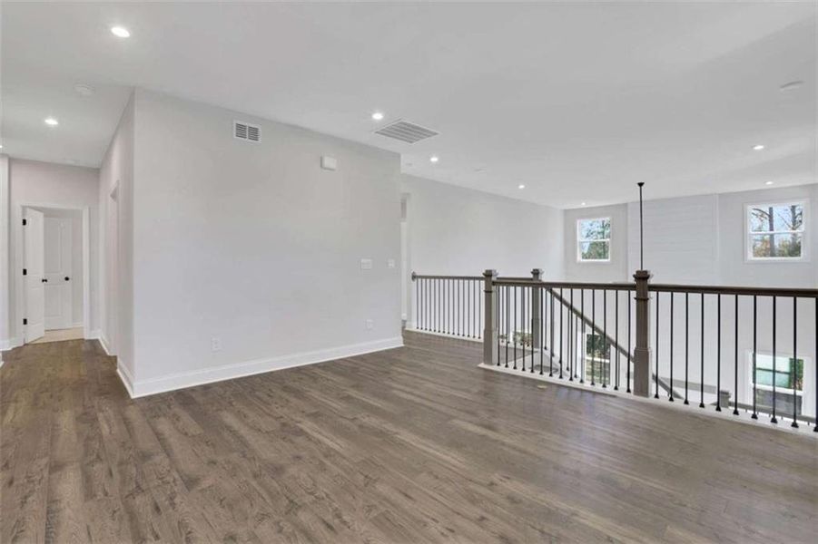 Spacious, unfurnished interior of a new home in The Paddocks at Doc Hughes, Buford (Image 29).