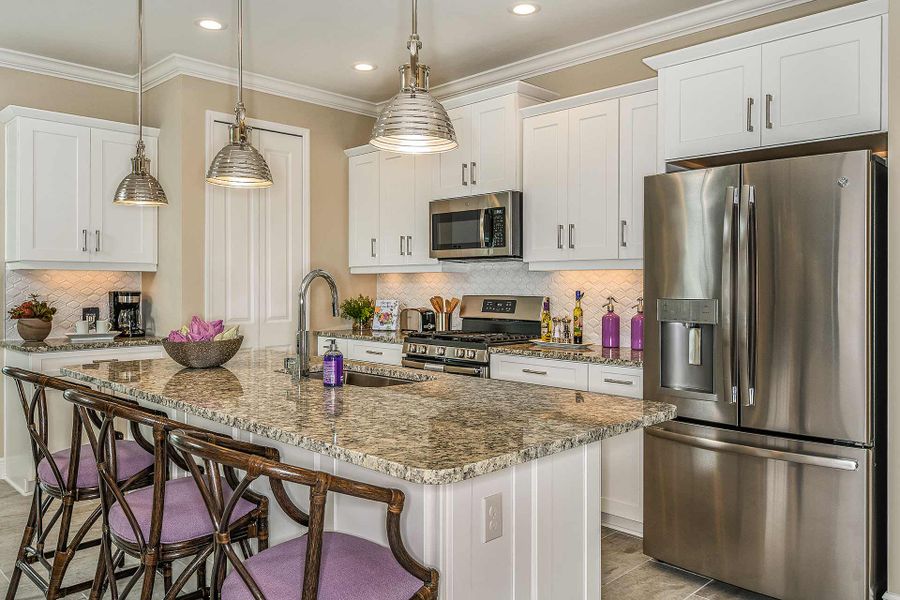 Representative furnished interior of a home built from the Sandcastle by Neal Communities in Grand Palm, Venice (Image 20).