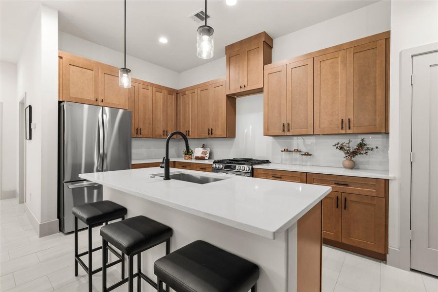 Kitchen – Previous work by the builder in the community, not representation of exact unit listed. Kitchen – Previous work by the builder in the community, not representation of exact unit listed.