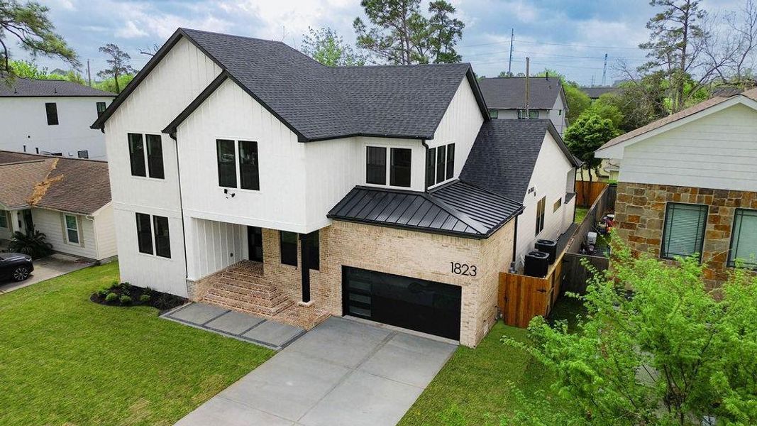 Front exterior of a new home in , Houston, TX, highlighting curb appeal (Image 1).