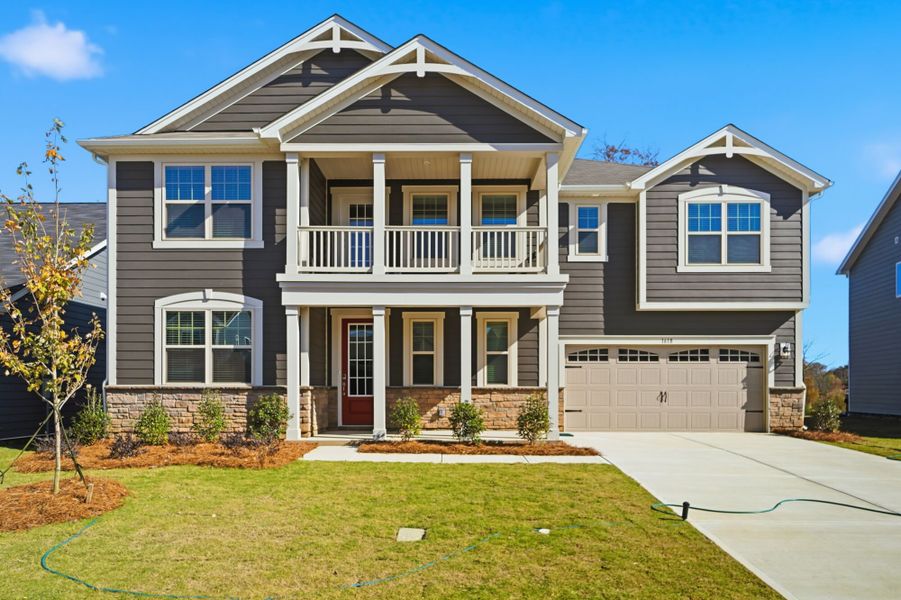 Front exterior of a new home in Waxhaw Landing, Monroe, NC, highlighting curb appeal (Image 1).