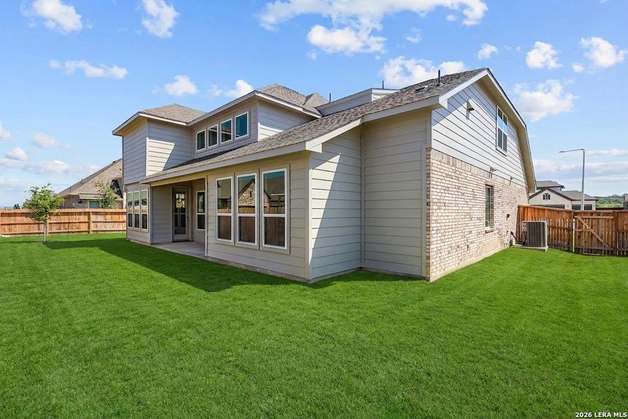 Exterior details and patio area of a home in Megan's Landing, Castroville (Image 3).