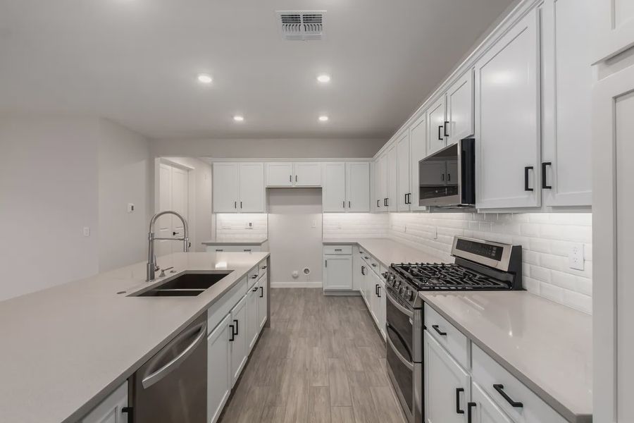 Furnished interior view inside a new home in Avanti at Granite Vista, Waddell (Image 9).