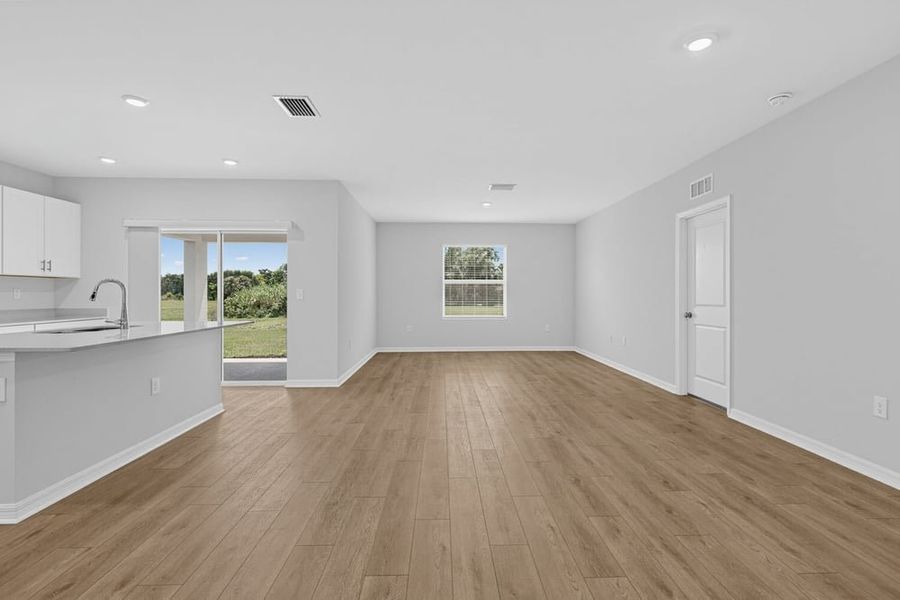Representative unfurnished interior of a home built from the Goldfinch by Taylor Morrison in Solena, North Fort Myers (Image 7). Representative unfurnished interior of a home built from the Goldfinch by Taylor Morrison in Solena, North Fort Myers (Image 7).