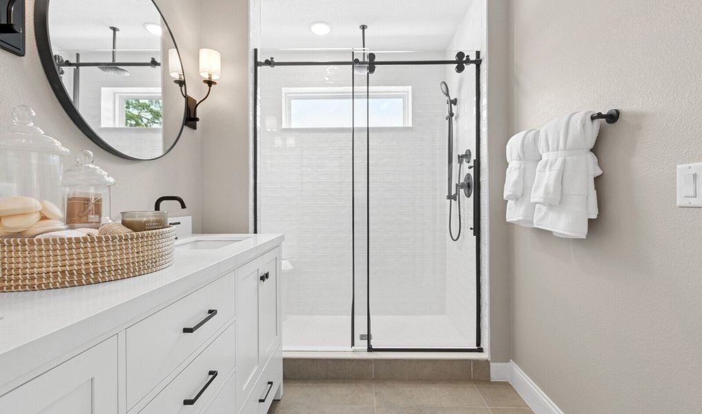 Matte black shower enclosure in primary bath Matte black shower enclosure in primary bath