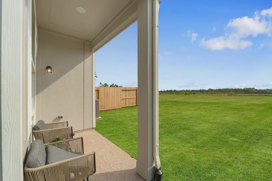 Exterior details and patio area of a home in Sienna Chateau, Sienna Plantation (Image 3).