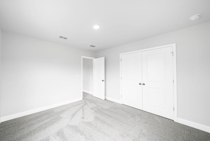 Spacious, unfurnished interior of a new home in Monroe Preserve, Chapin (Image 48).