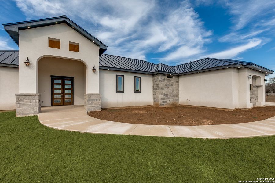 Exterior details and patio area of a home in , Castroville (Image 25).