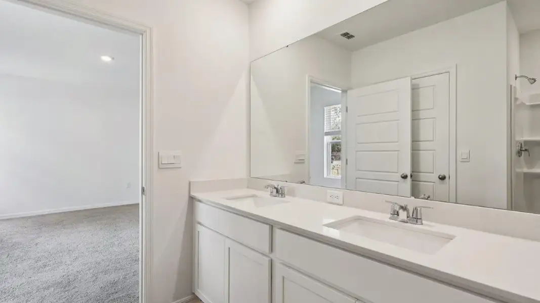 Furnished interior view inside a new home in Cascades, Davenport (Image 14).