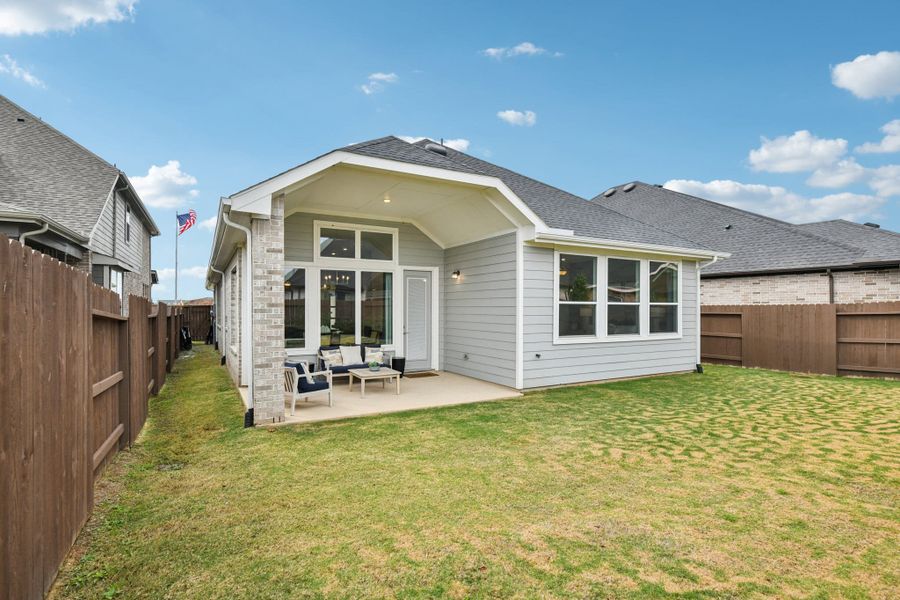 Exterior details and patio area of a home in Wood Leaf Reserve, Tomball (Image 27).