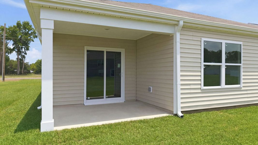 Exterior details and patio area of a home in Blair Ridge, La Grange (Image 23).