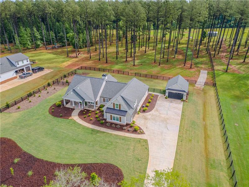 Front exterior of a new home in , Good Hope, GA, highlighting curb appeal (Image 26).