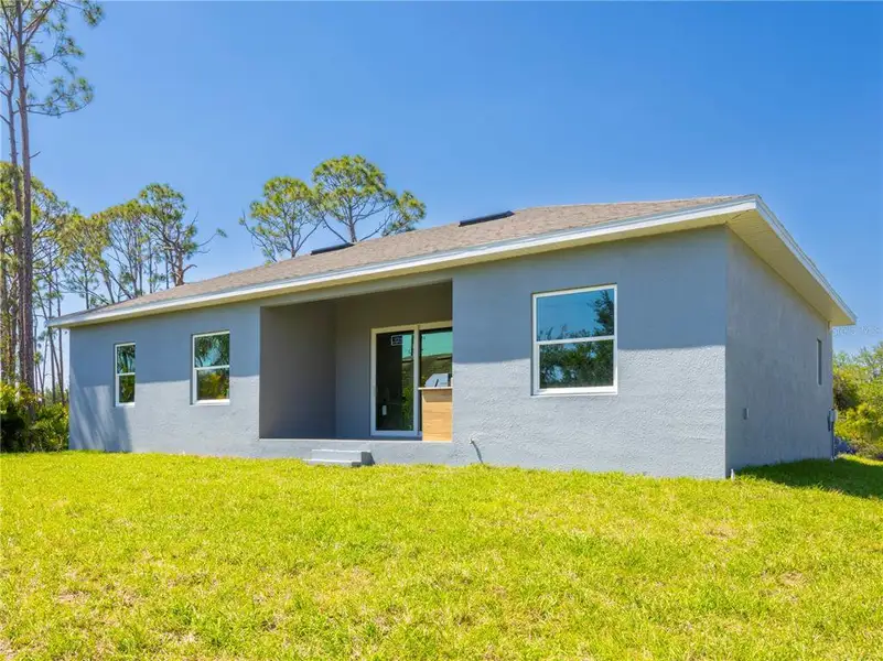 Exterior details and patio area of a home in , Port Charlotte (Image 3).