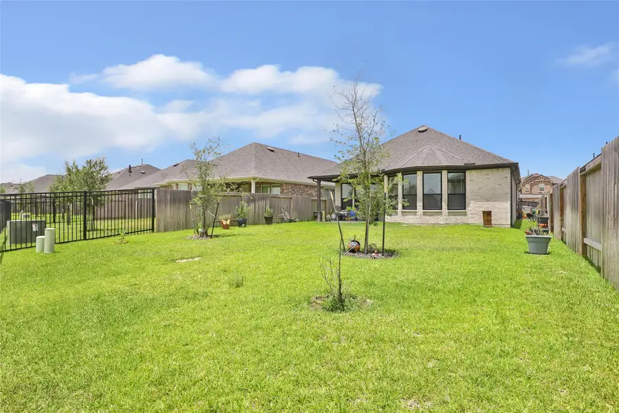 Exterior details and patio area of a home in , Tomball (Image 25). Exterior details and patio area of a home in , Tomball (Image 25).